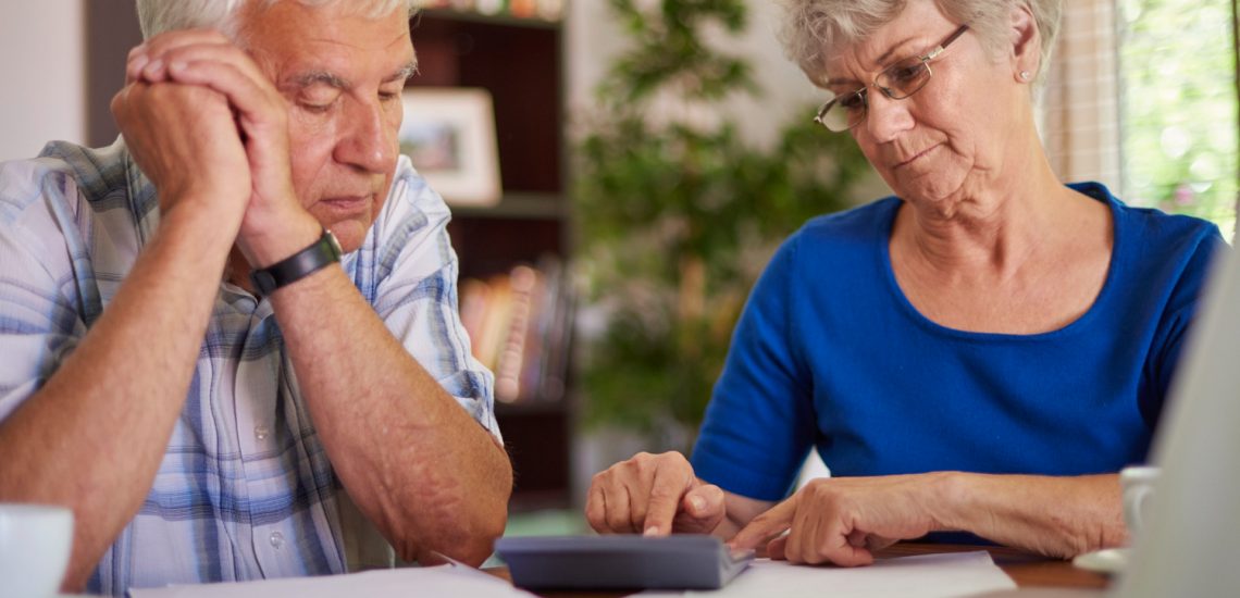 couple reviews their tax bill at the end of the year.